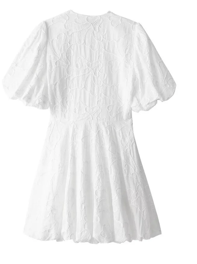 White Dress with Embroidered Ruffles and Sleeveless Design